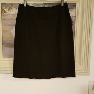 Black pencil skirt with kick pleat